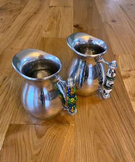 Jug with beaded or ceramic handle
